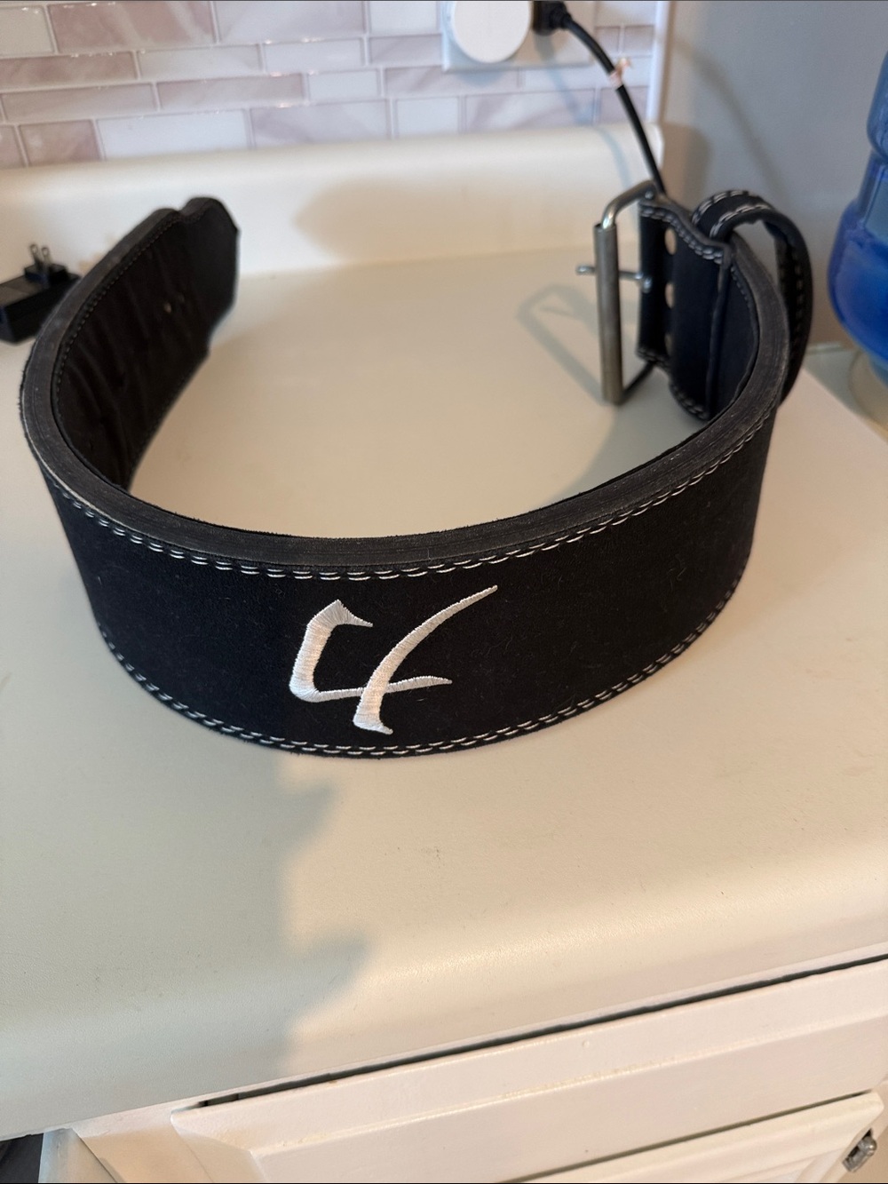 Men's Black Weightlifting Belt with White Stitching and Logo
